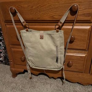 Canvas, backpacks in three colors. Black, brown and khaki. New with no tags.